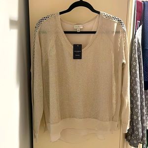 Never worn Lucky Brand. Sweater with silky shirt. Beautiful arm detailing.